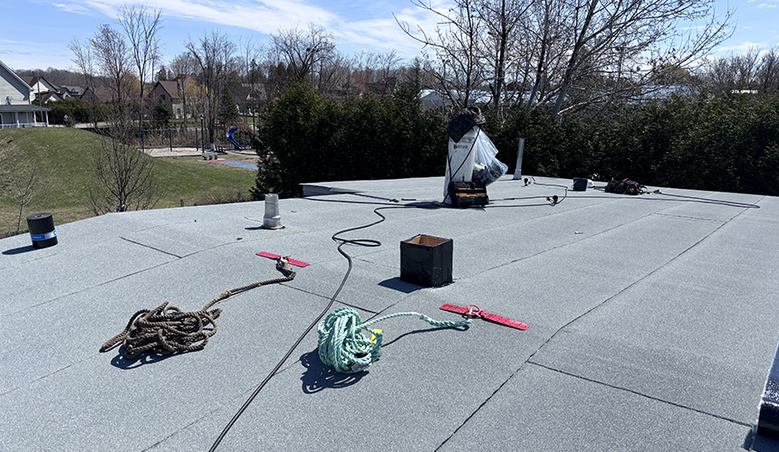 Installation membranes élastomères à Sainte-Sophie.